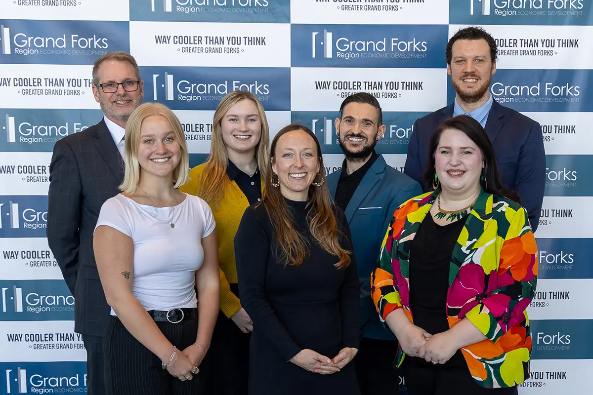 the EDC staff stand together posing at the 2026 edc annual meeting.