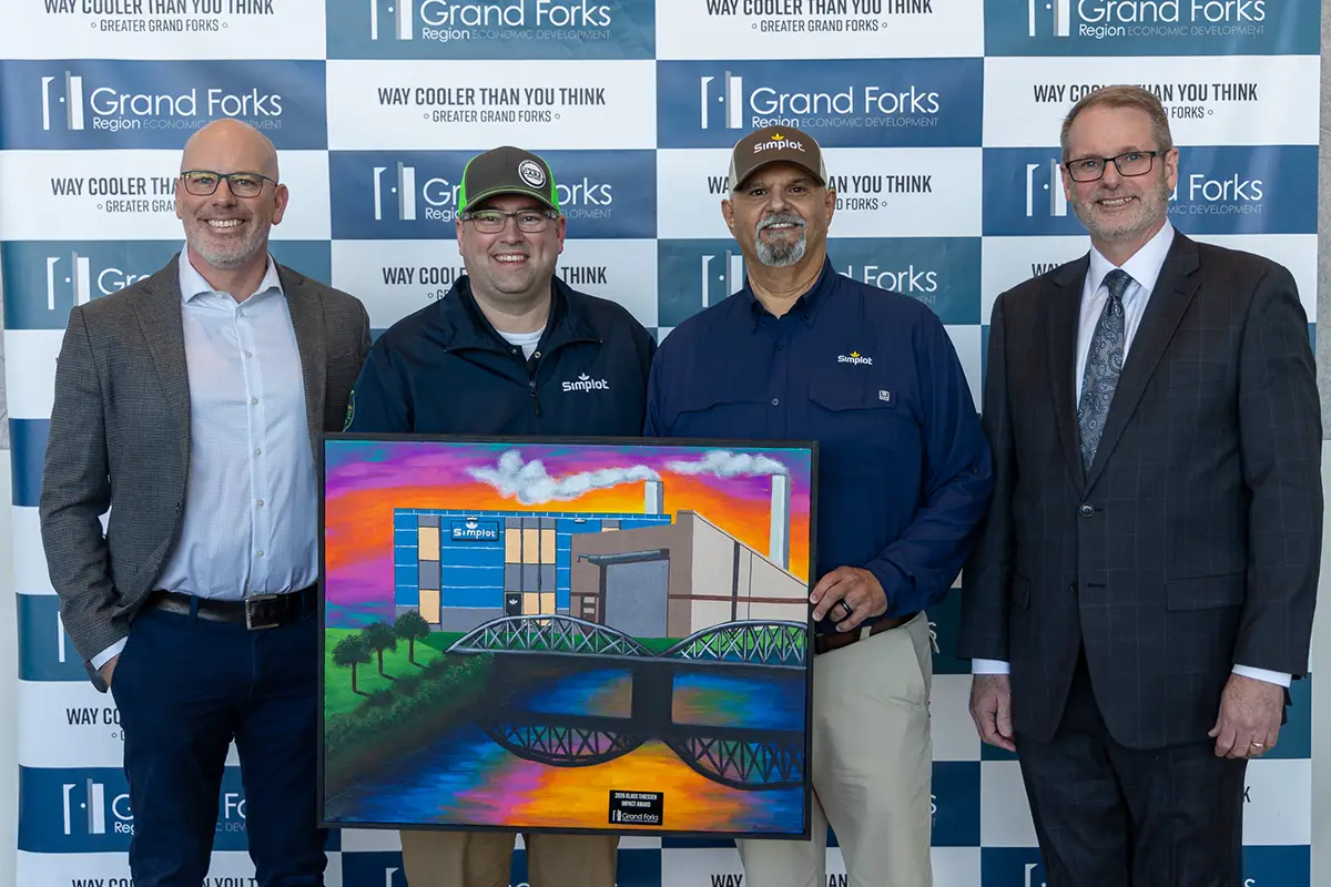 Simplot Representatives hold the 2026 Klaus Thiessen Impact Award with